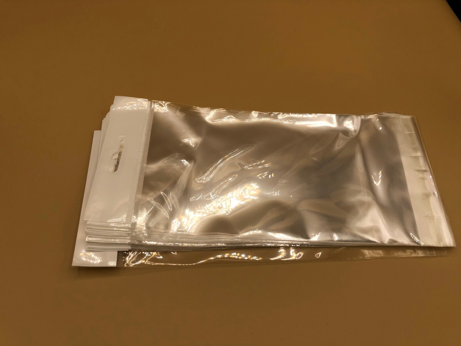 100 Clear Cello Bags HANG TOP, Resealable Self Adhesive OPP Poly Hang Hole bag