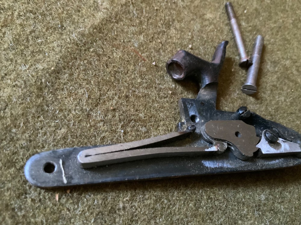 Percussion lock with screws