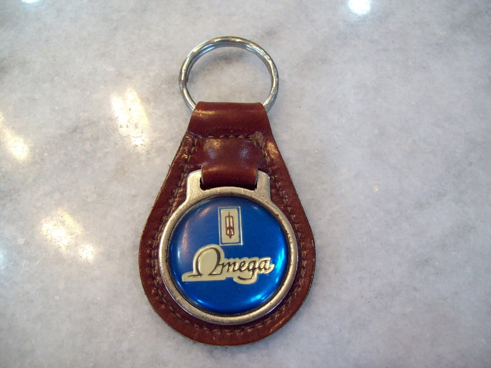 OLDSMOBILE  OMEGA   KEY CHAIN .......