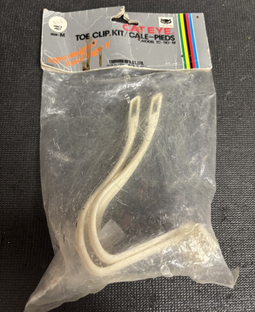 NOS Cateye Toe Clip Kit, white, medium mountain toe clips