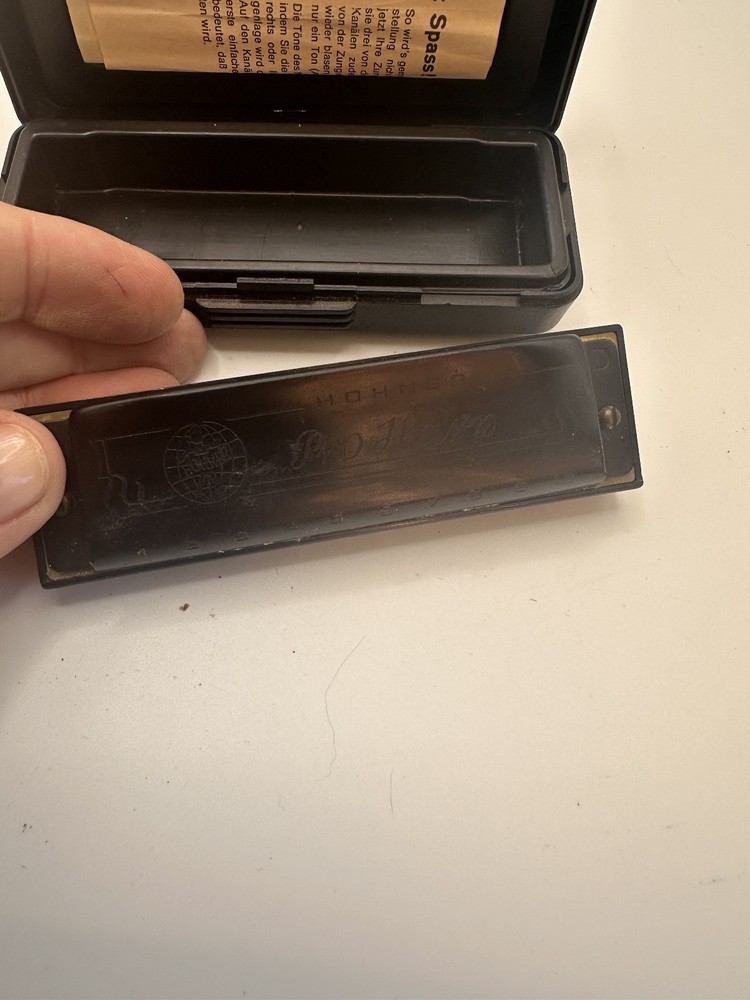 Vintage Old Black Hohner Pro Harp Harmonica D