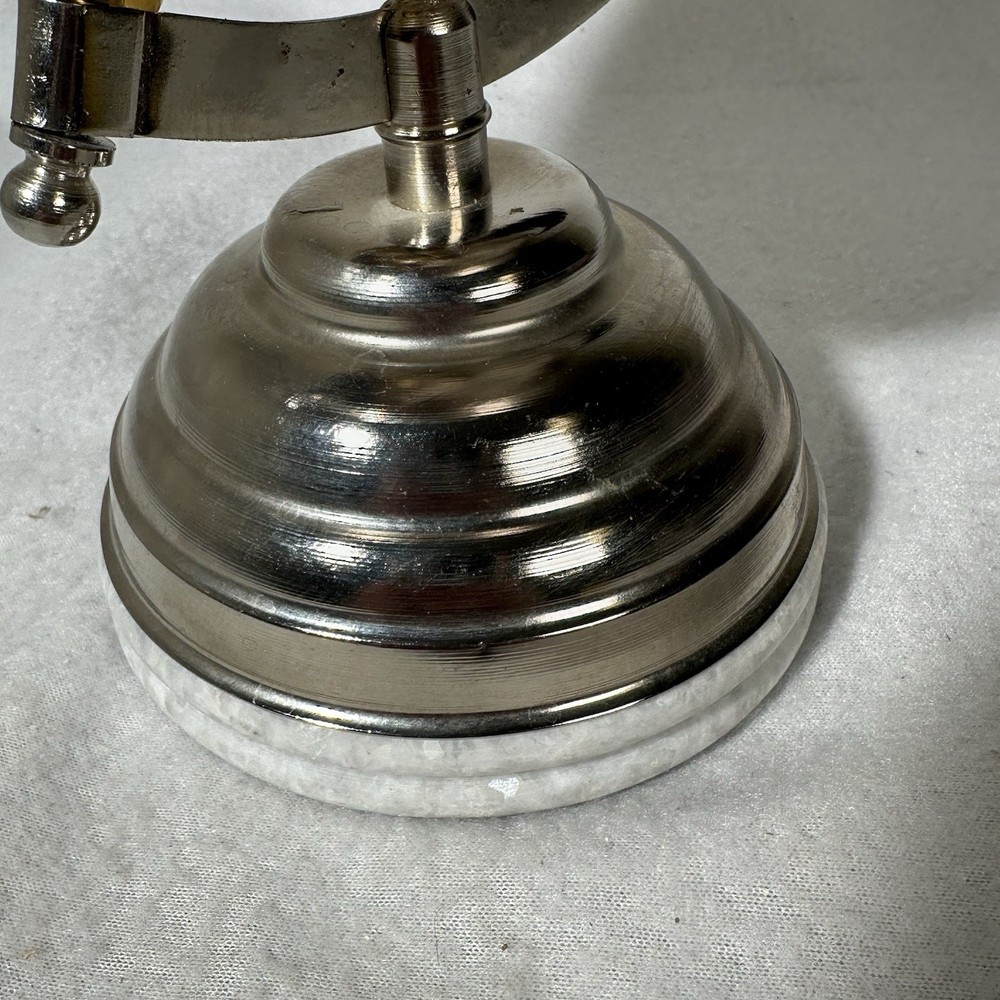 Small 9” Silver Globe Spins On Axis with Base