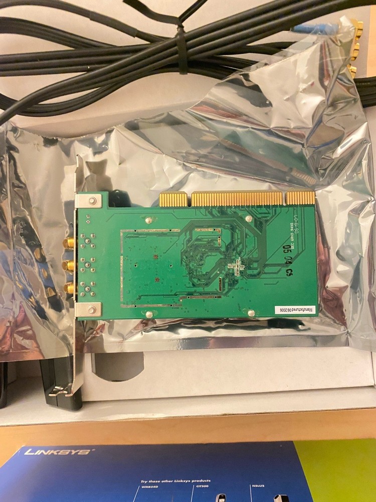 Linksys WMP300N Wireless‑N PCI Adapter With Box & Antenna Base (System Pull)