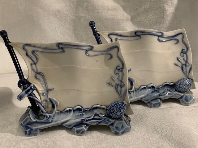 two antique place cards, menu stands maritime theme
