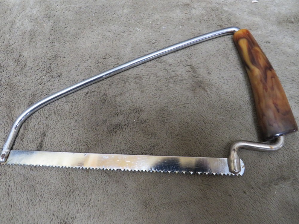 Vintage Bakelite Tortoise Shell Handle BONE SAW