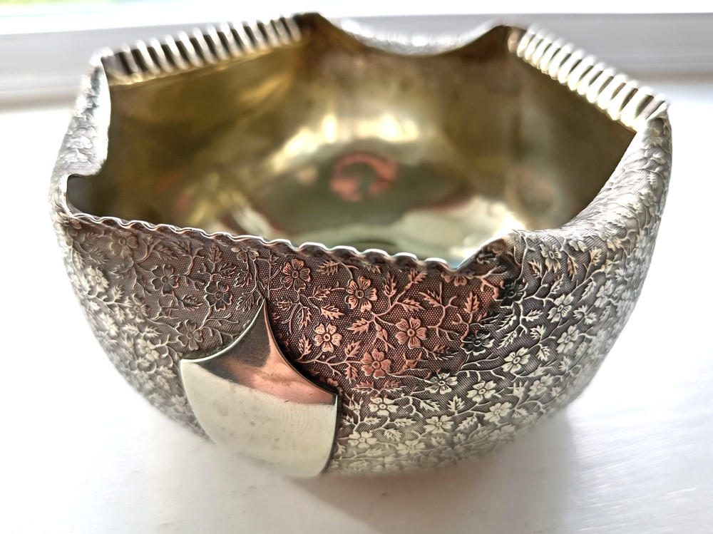 Silver plated very ornate rose bowl.