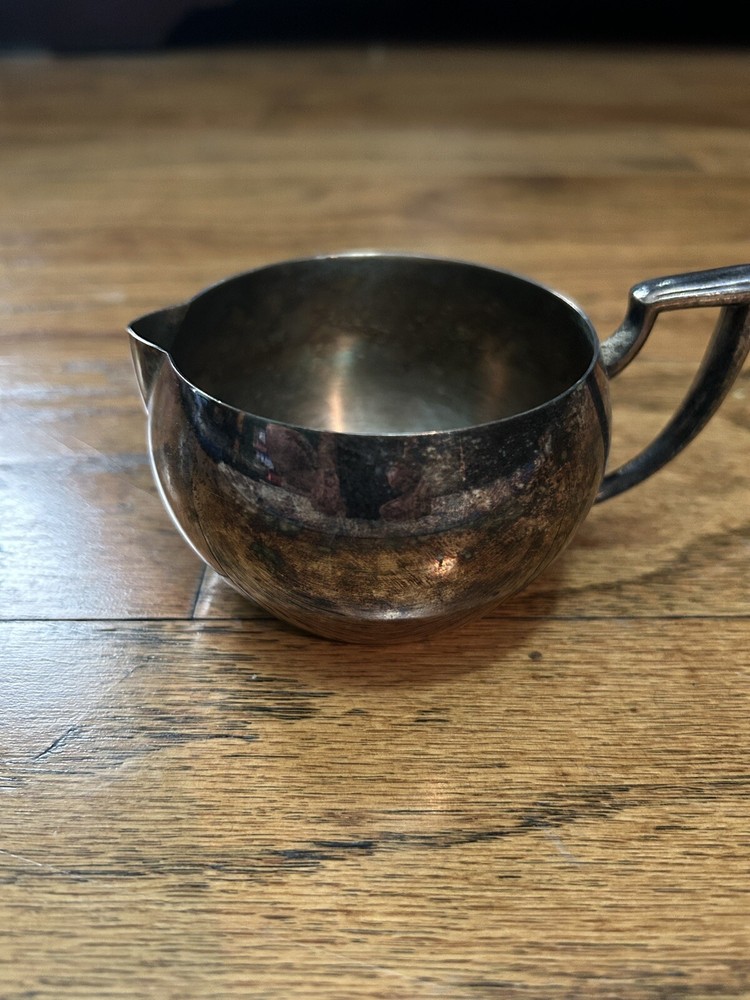 Oneida silversmiths Creamer