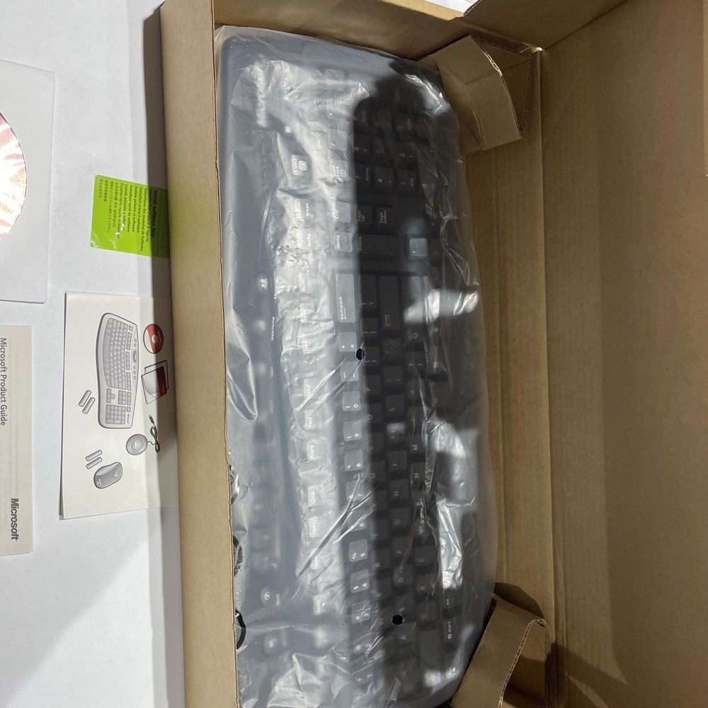 Microsoft Wireless Optical Desktop 1000 Keyboard & Mouse New, unused OPEN BOX