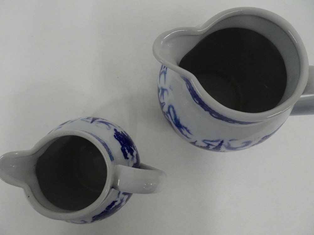 Pair Matching Ceramic Pitcher Creamers w Blue Castle Pattern