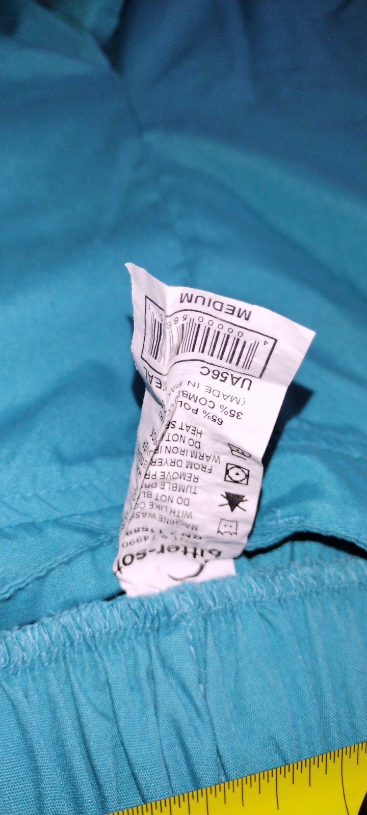 SET OF 2SCRUB TOPS AND MATCHING PANTS FOR BOTH IN MED.