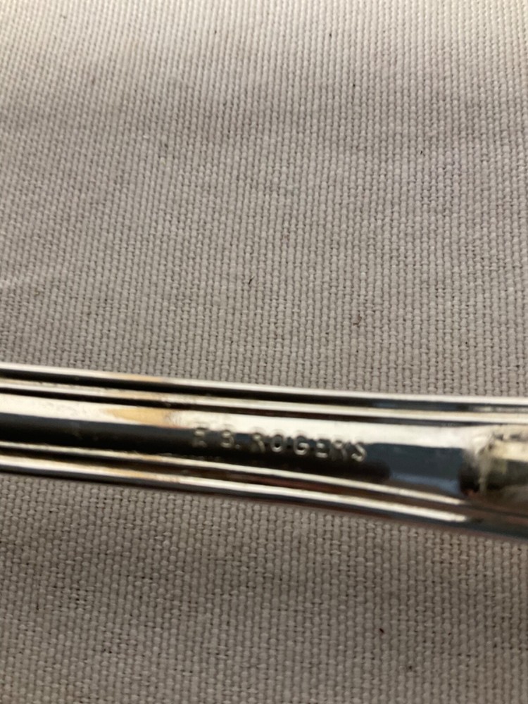 E B Rogers soup ladle silverplate attached rest 10”