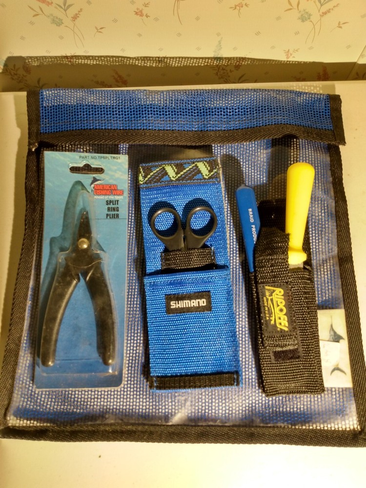 Nantucket bound inc lure bag, shimano scissors, split ring pliers, sharpener.
