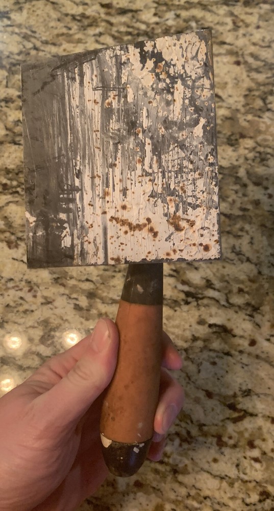 inside corner trowel 5” x 4” with wood handle