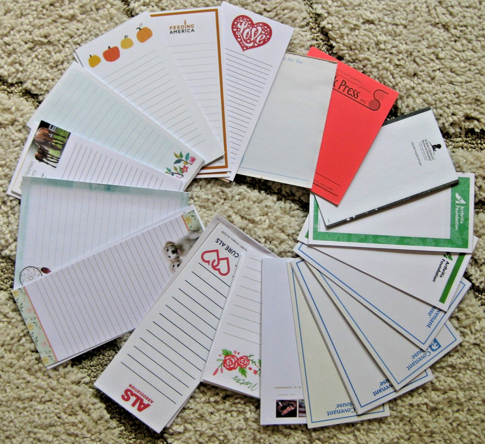 30+ miscellaneous notepads.