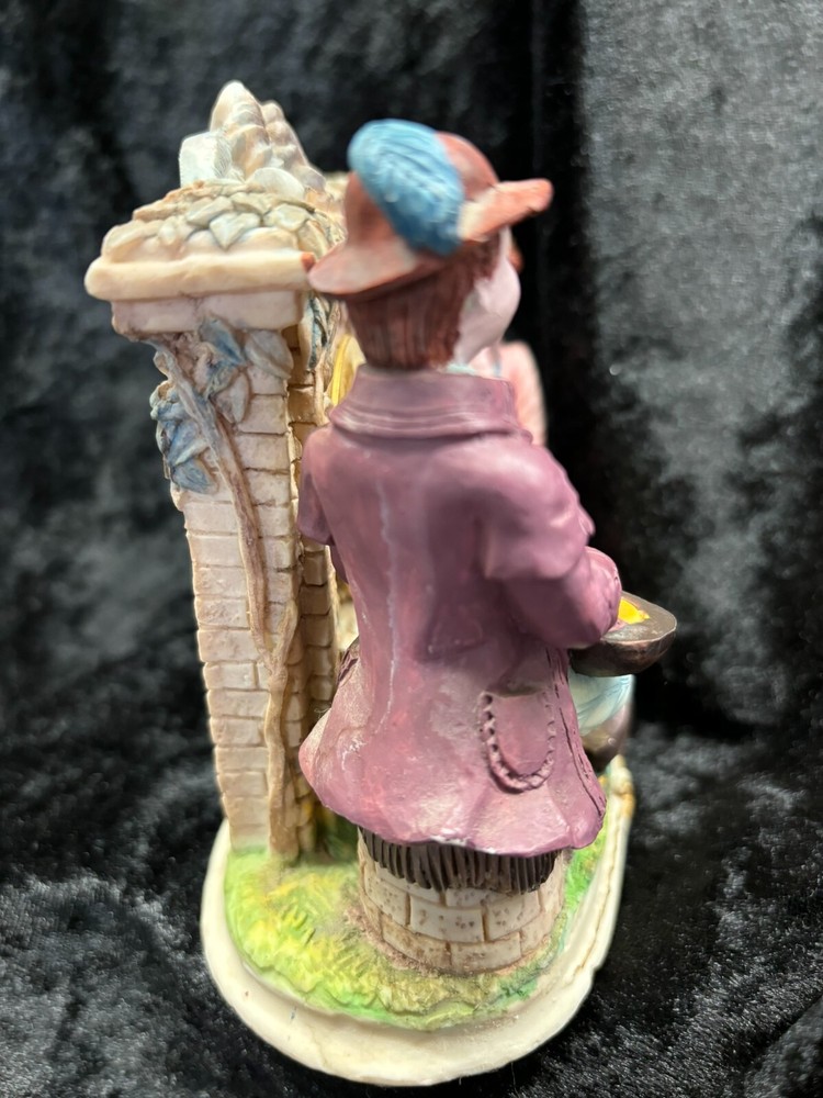 Colonial Couple Figurine w/Clock Purple & Pink Clock Does not work