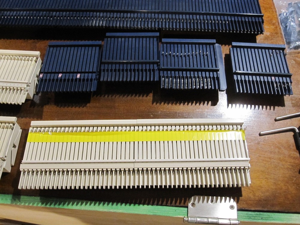 Bond Knitting Machine Two Beds Plus Extensions, Cast on Combs, some Accessories.