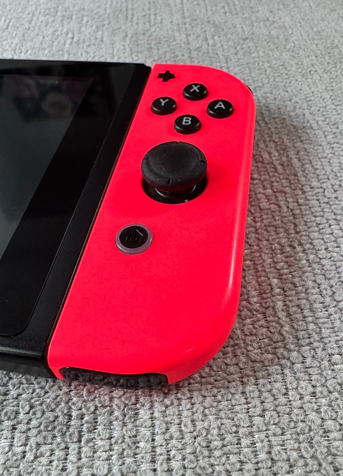 Nintendo Switch Console Plus Neon Red and Neon Blue Joy-Con set