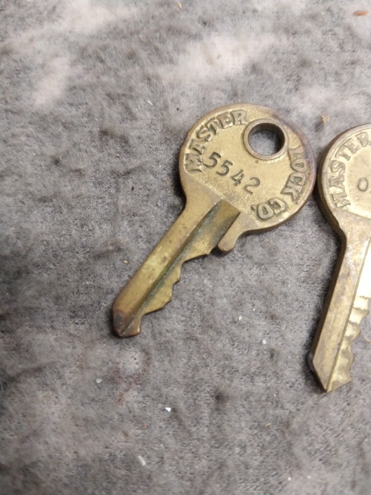 3 old master lock keys