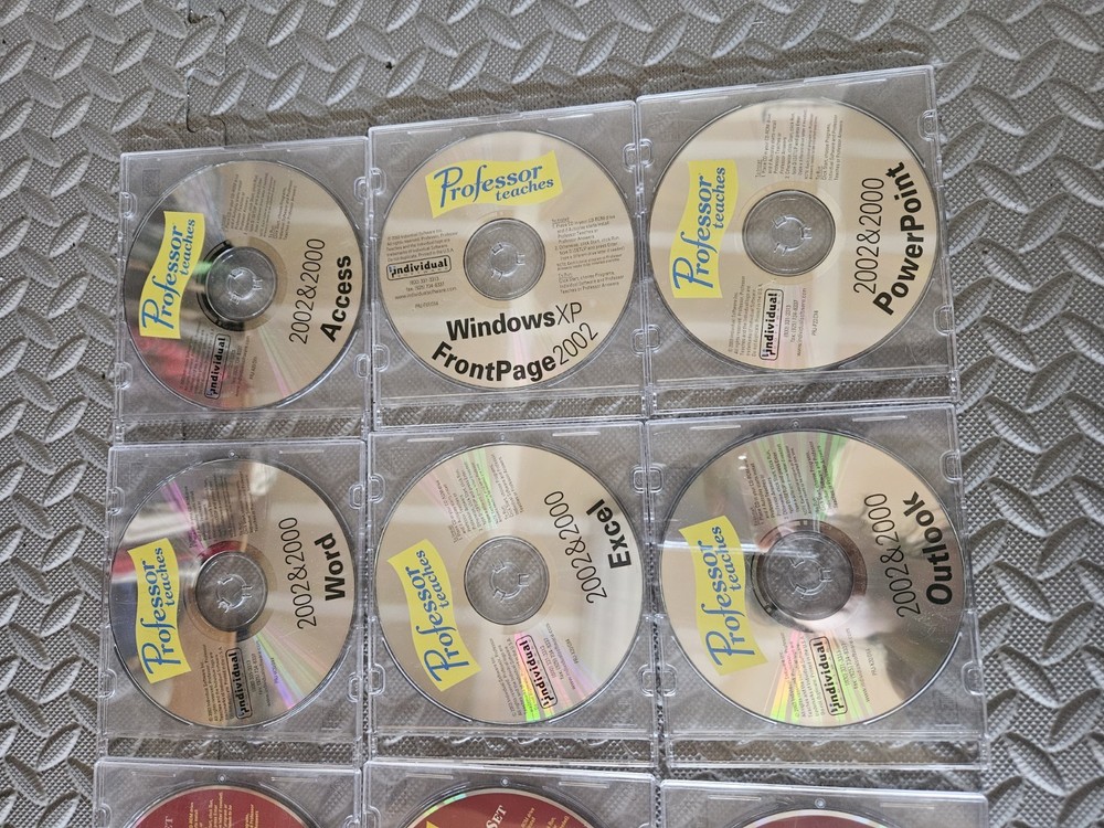 Professor Teaches Office 2000- 2002-2003 set. 16 cds