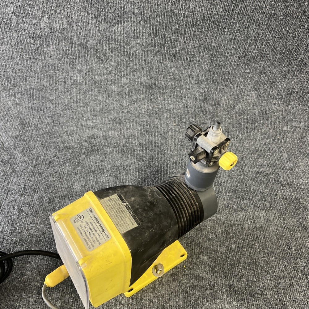 LMI Milton Roy AA751 120Vac Metering Pump W/Attached Programmable Divider Used