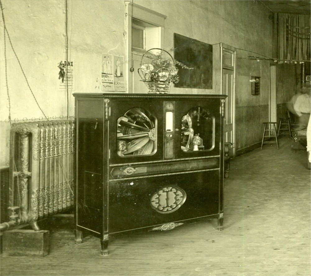 STORE INTERIOR – COIN OP - 1928 MILLS HIGH BOY JUKEBOX