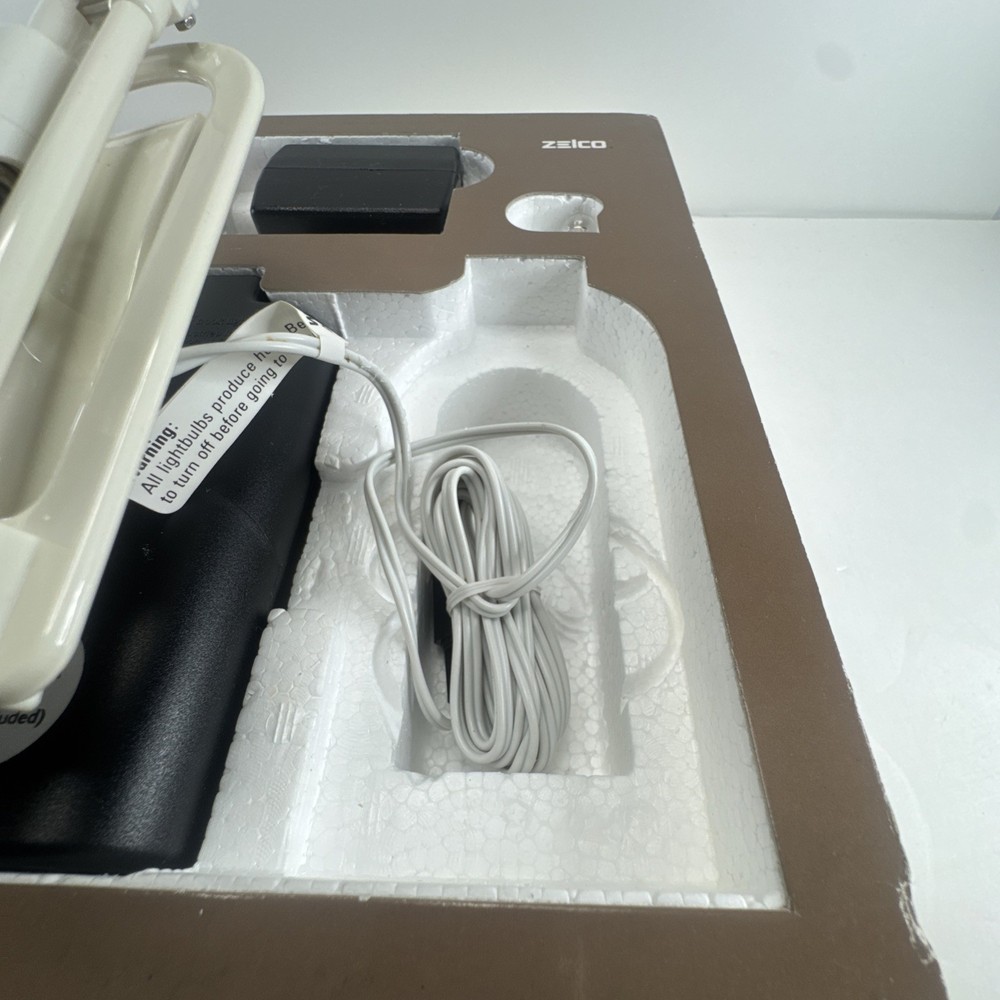 Zelco The Itty Bitty Book Light Original Reading Lamp