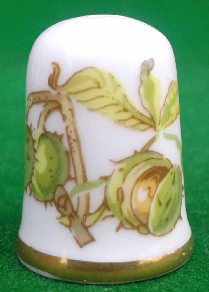 9 CAVERSWALL BONE CHINA THIMBLES.