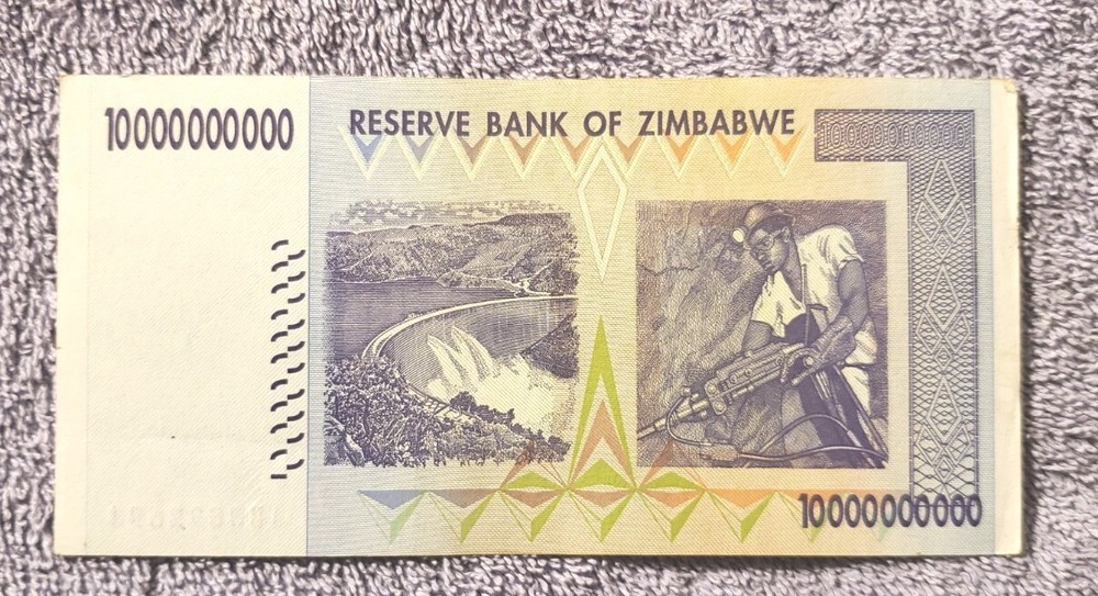 IT. # G-249 / One Zimbabwe $10 BILLION NOTE CIRCULATED CONDITION