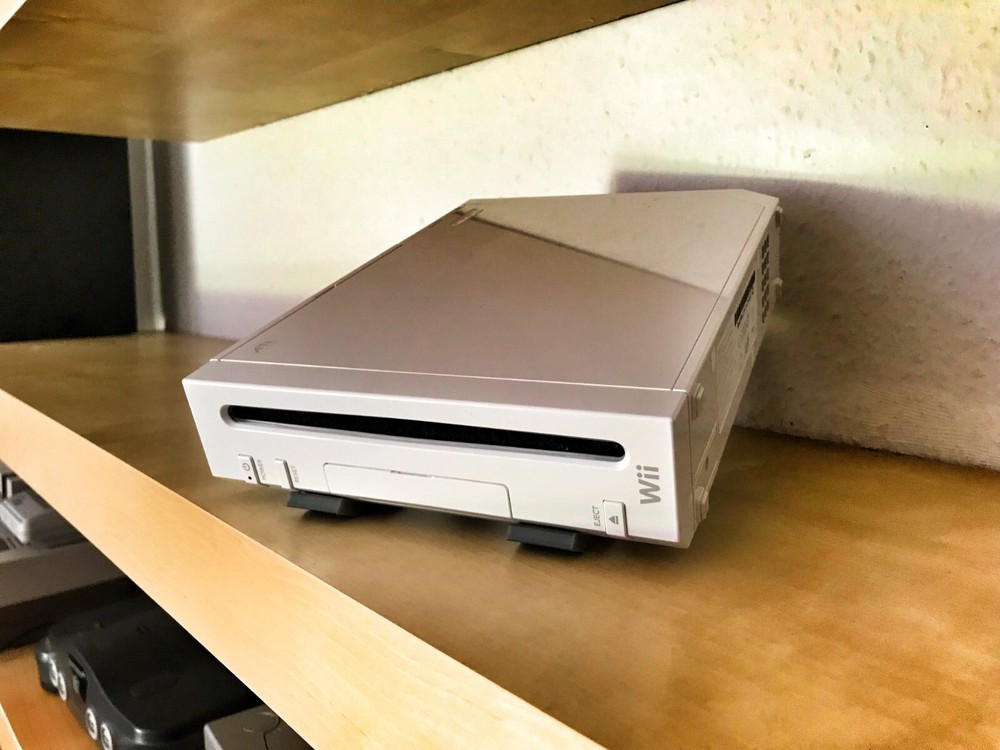 Universal game console stand display