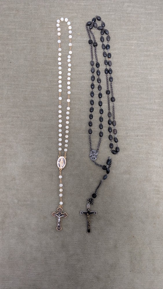 Two Catholic rosaries traditional prayer tools for meditation in Christianity