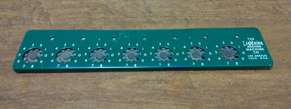 The Lightning Adding Machine CO 7 Digit Mid Century Mechanical Calculator