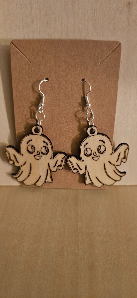 Ghost Pair – Cute floating ghosts with cheerful expressions.