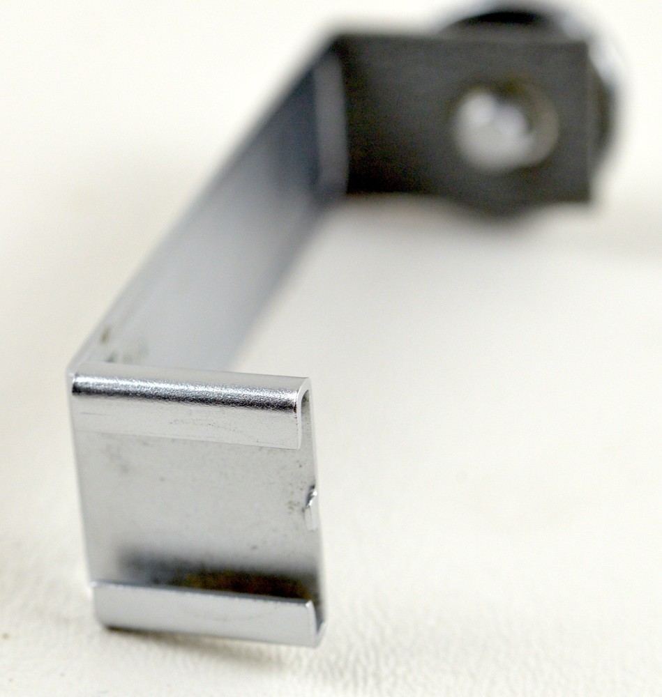 Olympus Pen (EE, D) accessory/flash shoe bracket.