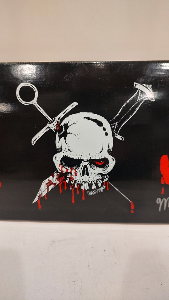 Murder Junkies skateboard signed by GG's brother Merle