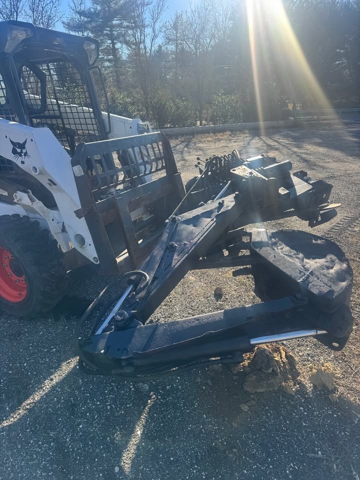 Heavy-duty white backhoe-used good shape