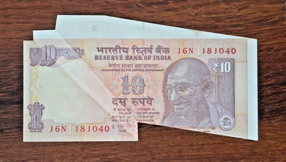 10 Rs Error  - Huge Extra Paper with cutting error - India