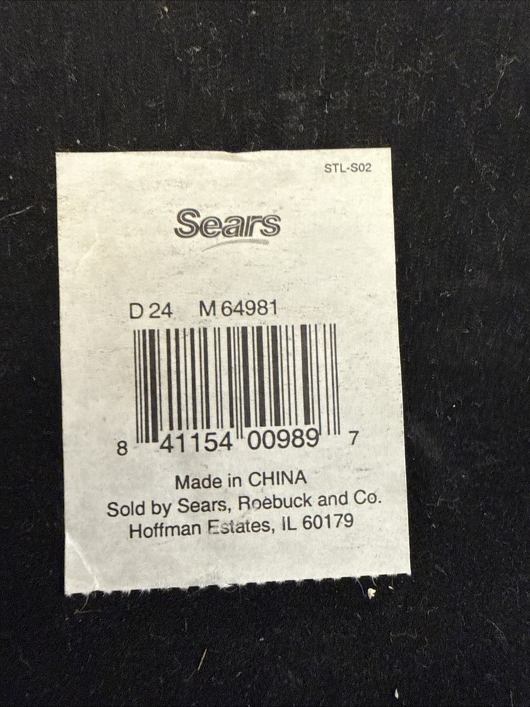 A decorative box with geometric inlay pattern, sold by Sears.