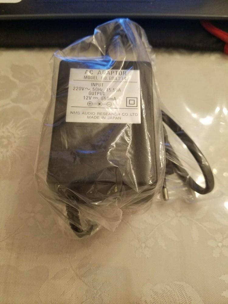 AC ADAPTOR MODEL NO. EOIL 214