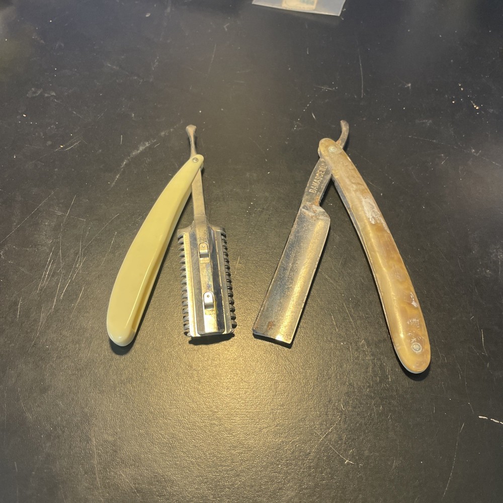 Two vintage straight razors