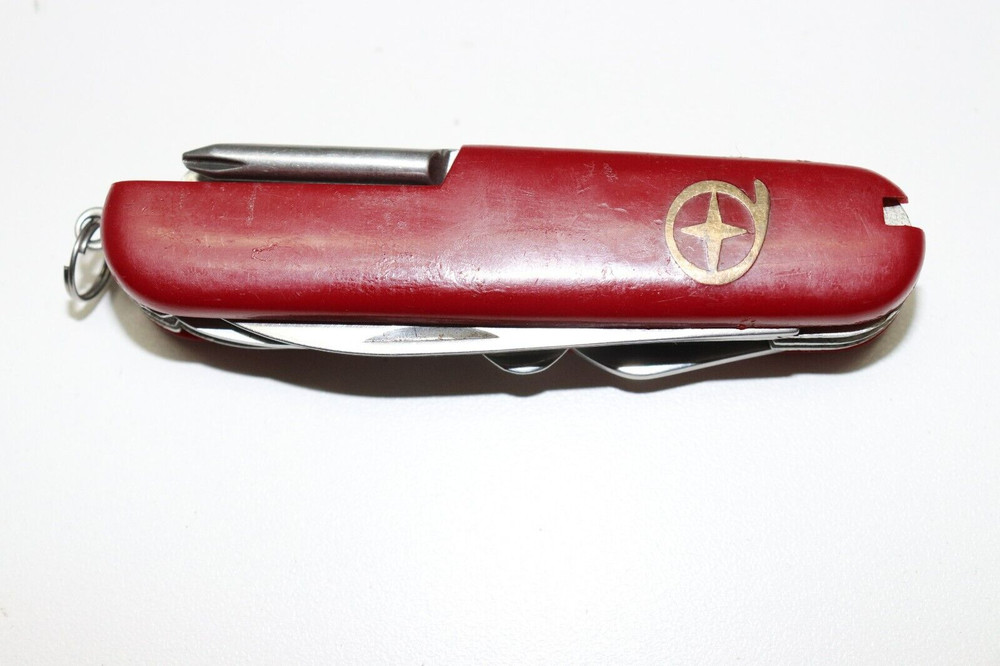 Rostfrei Pocket multitool red plastic handles gold mark E633