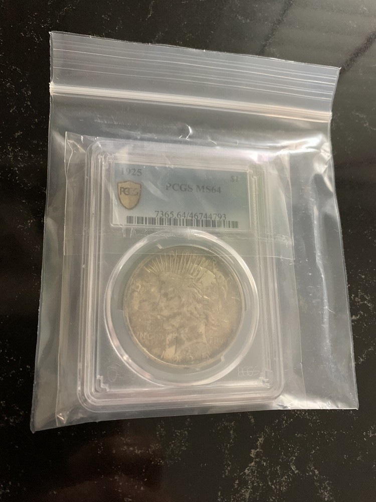 1925 PCGS/MS64 Monster Toned Peace Dollar