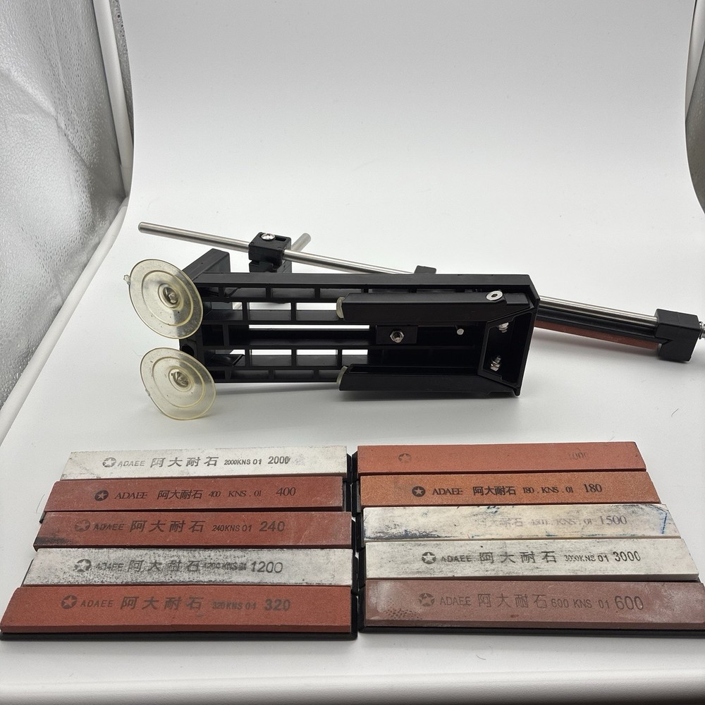 Fixed Angle Knife Sharpener Comes With Seven Whetstone Blocks And Bag