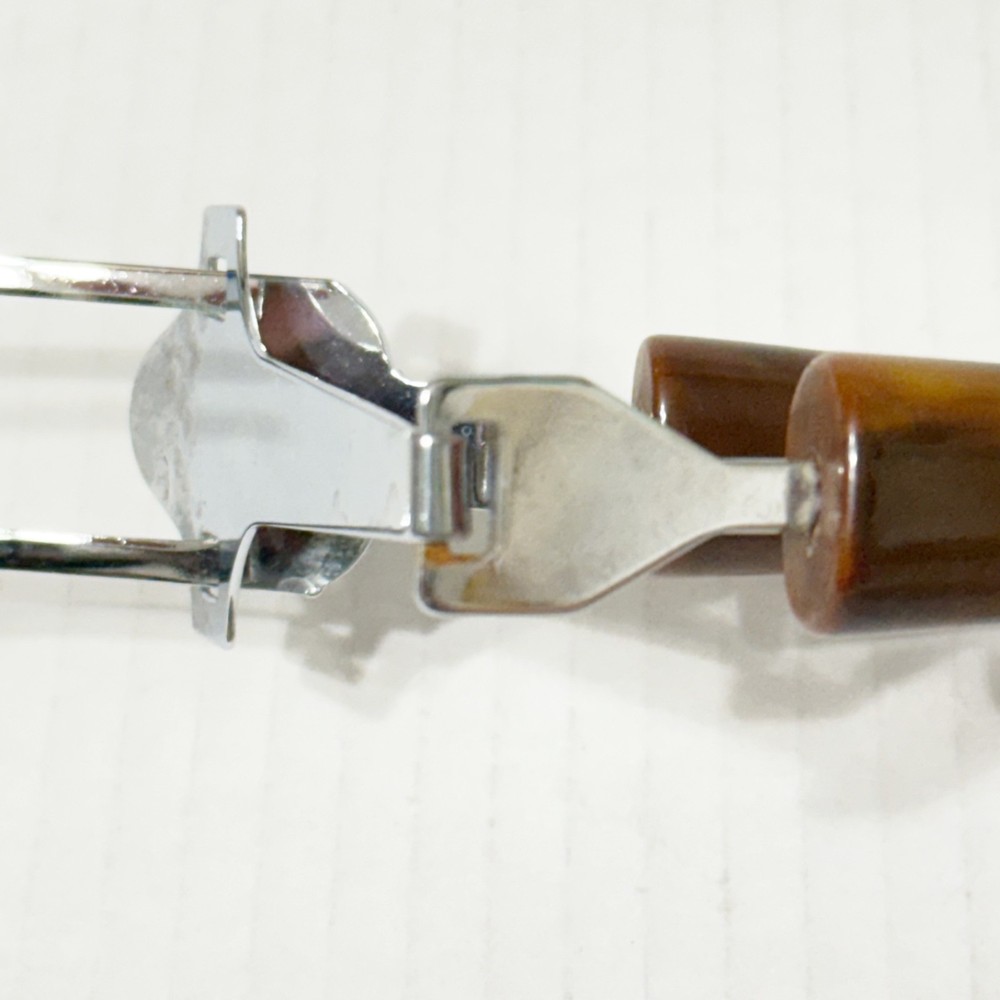 Vtg Two Prong Meat Server Tool with Bakelite Tortoiseshell Handles Springloaded