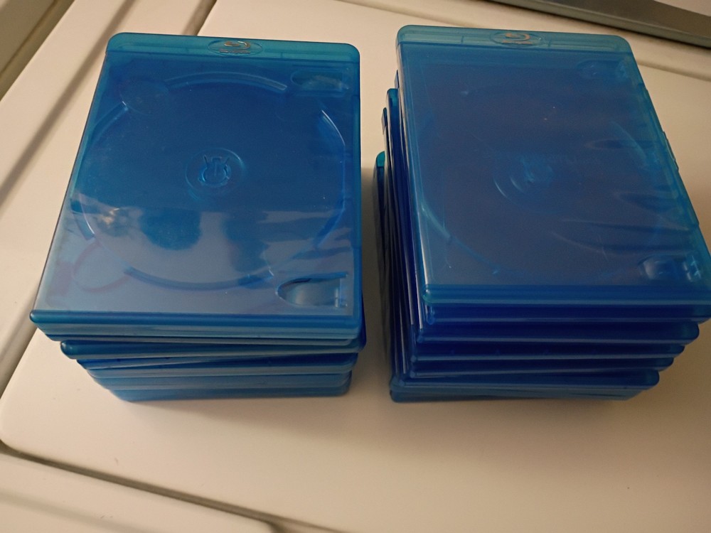(12) ASSORTED BLU-RAY- DVD CASES. "asstd sizes"