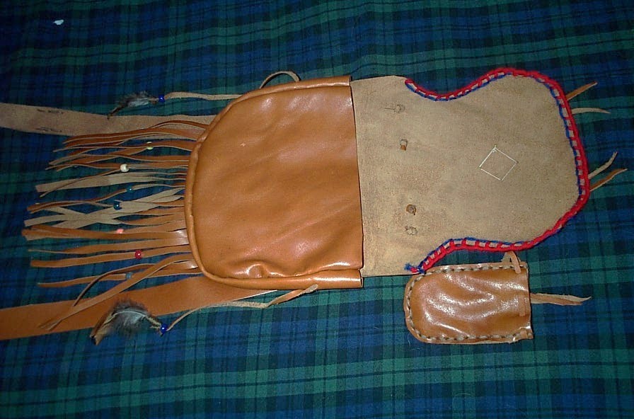 BLACK POWDER, MOUNTAIN MAN , BEAVER TAIL, ROSETTE, LEATHER POSSIBLE BAG