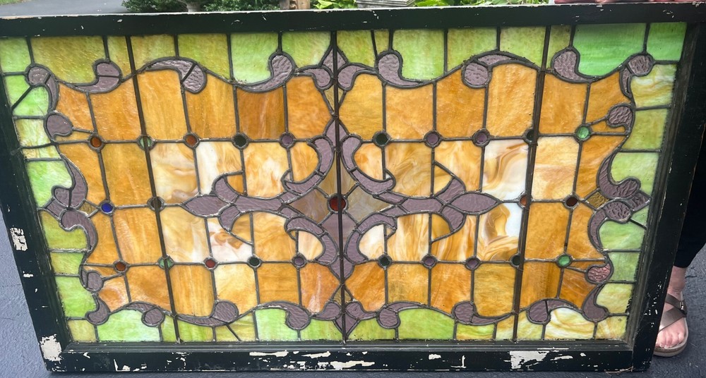Antique stained glass landing window