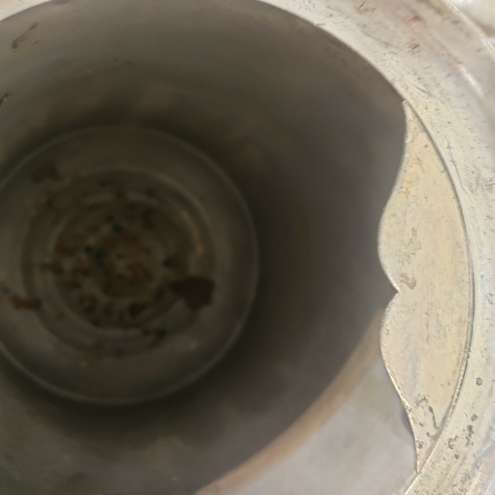 James W. Tuft silverplated tilting water pitcher. 20" tall. 