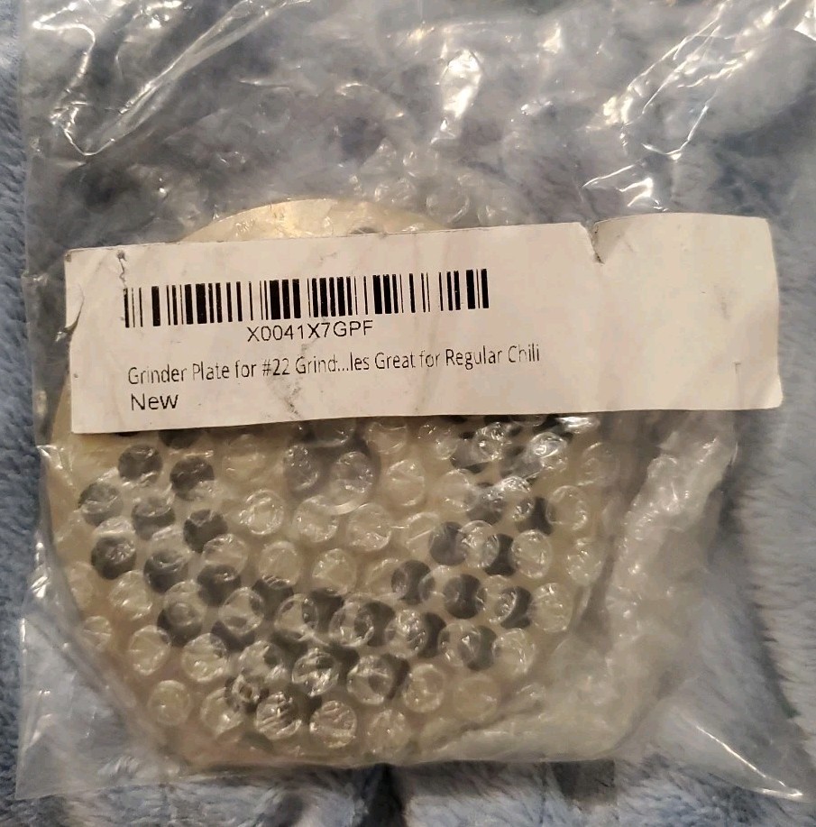 Grinder plate for #22 grinders with 1/4" hole, reversible