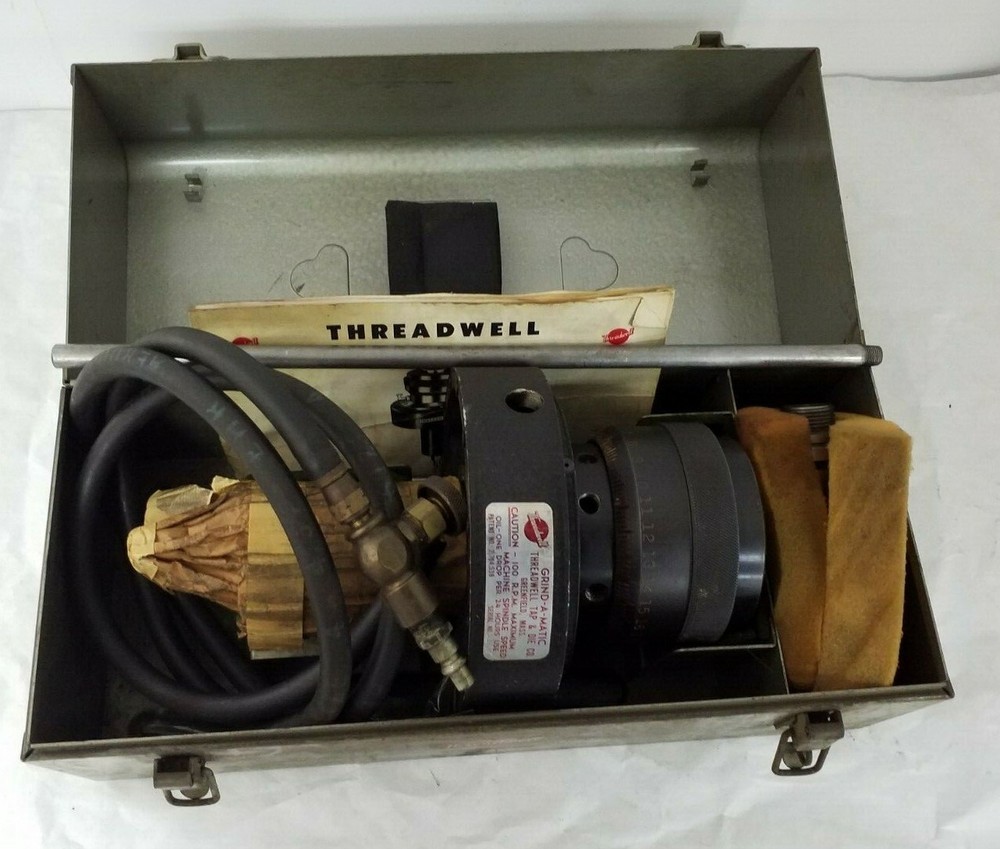 THREADWELL GRIND-A-MATIC GRINDER WITH METAL CASE