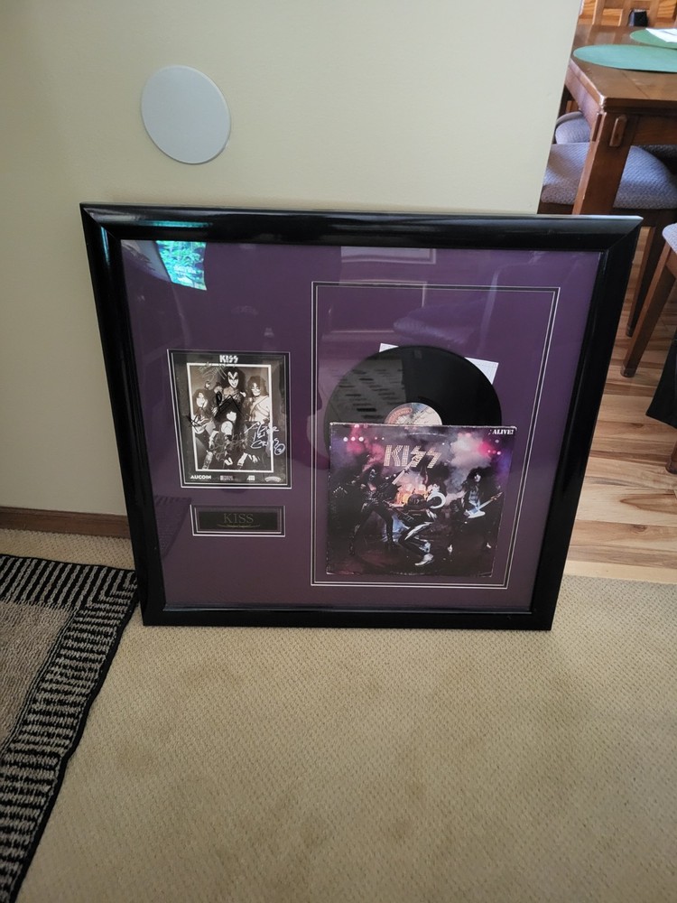SIGNED KISS BAND MEMOROBILIA FRAMED FROM VEGAS